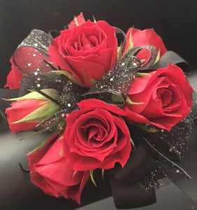 Ravissant corsage de poignet rouge