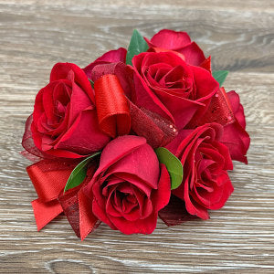 Corsage de poignet rouge rubis